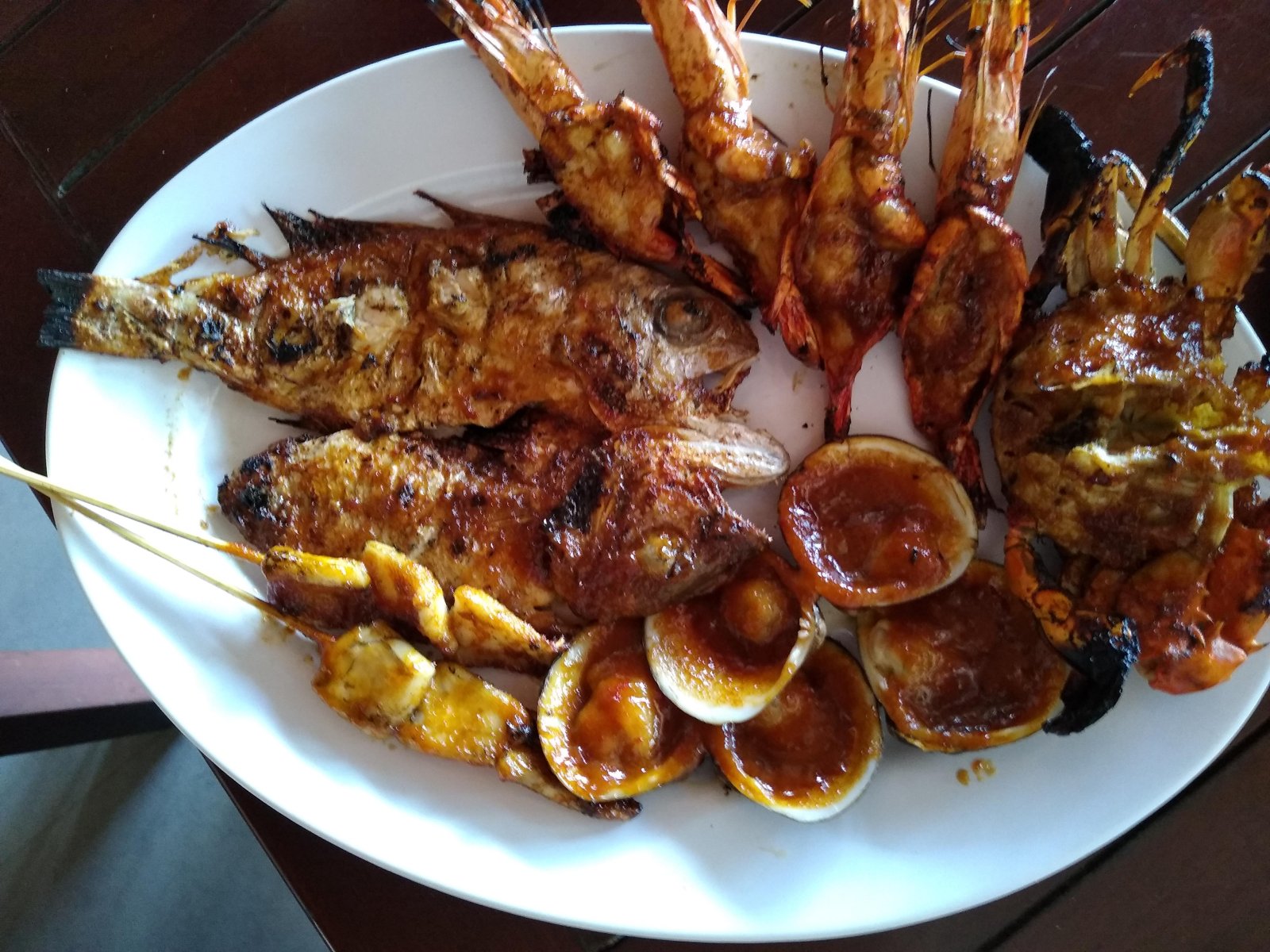 Bali | Beachside cafés on Muaya beach in Jimbaran Bay  - Kabupaten Badung | Secret World Trip Planner