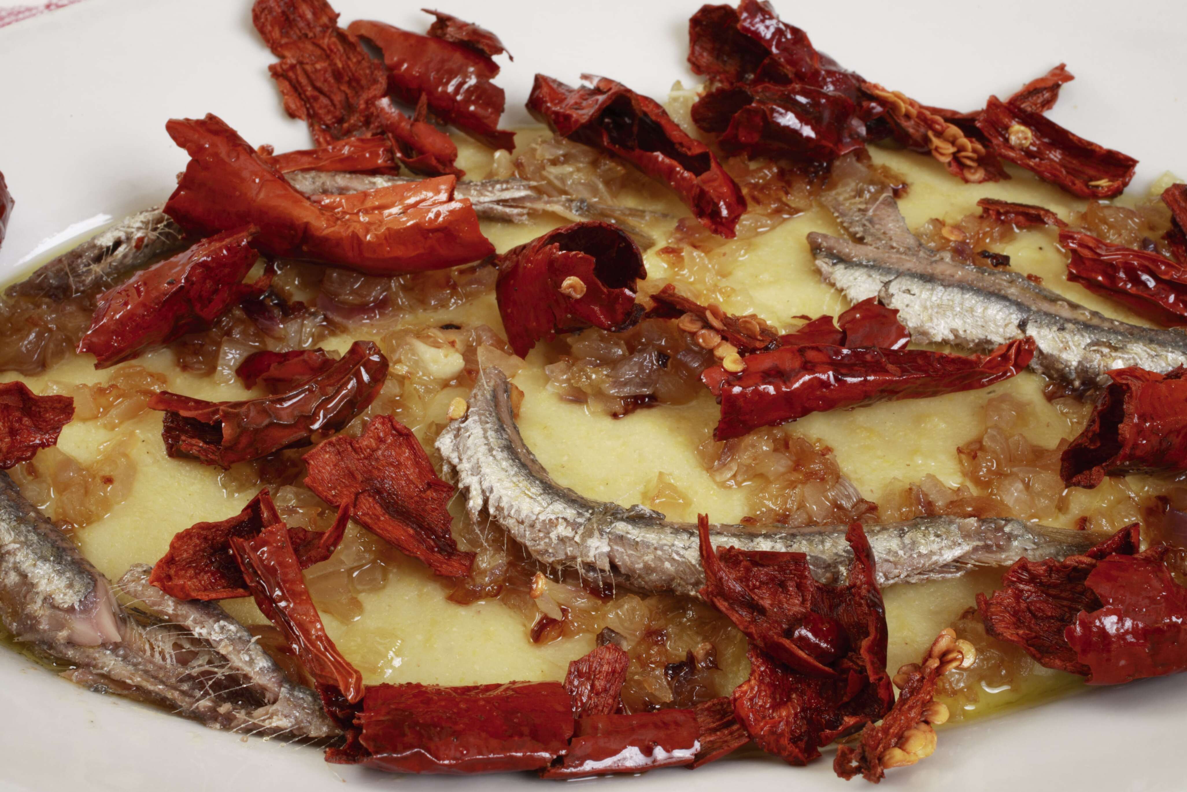 Grão-de-bico Fracchiata e polenta de erva - Pescara | Secret World Trip Planner