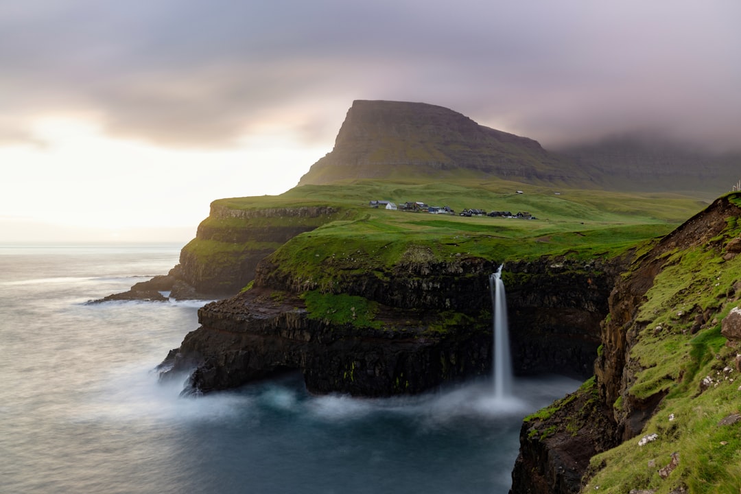 Waterfall Múlafossur and the village of Gásadalur - Gásadalur | Secret World Trip Planner