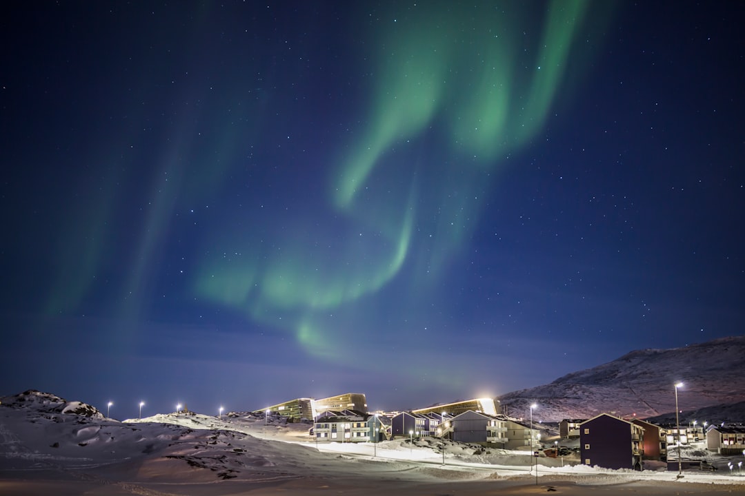 Northern lights above Nuuk in Greenland - Nuuk | Secret World Trip Planner