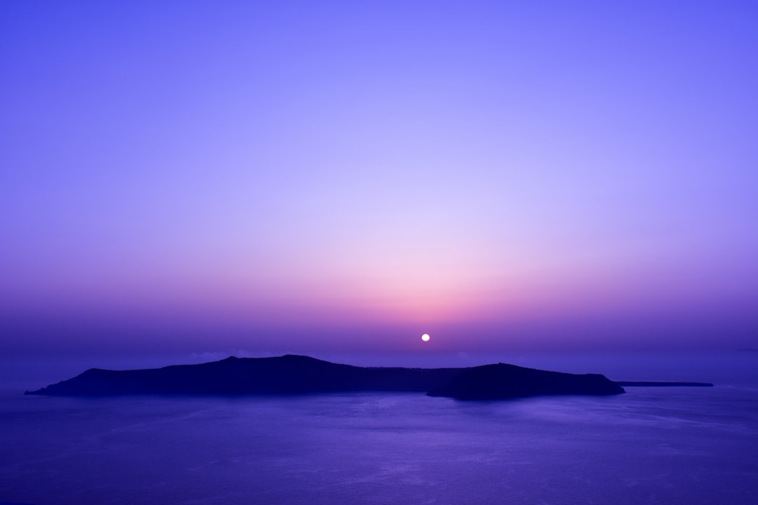 Dreamy Sunsets in Santorini: The Magic of Oía - Nik. Nomikou | Secret World Trip Planner