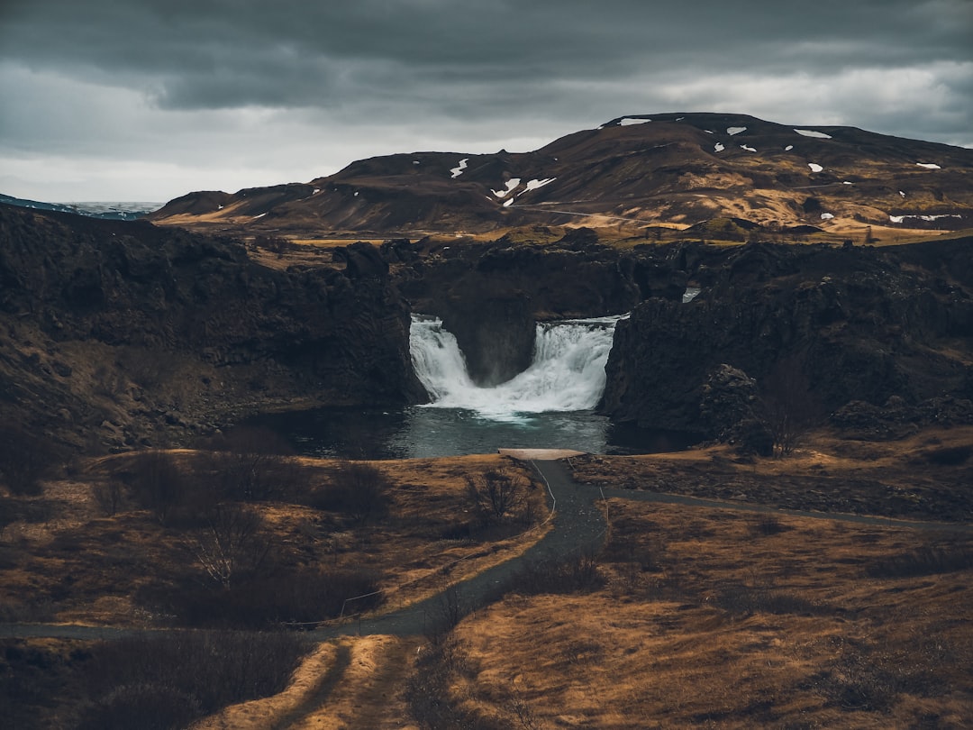 Hjálparfoss: The Twin Waterfalls of Basalt Arena - Hjálparvegur 3361 | Secret World Trip Planner
