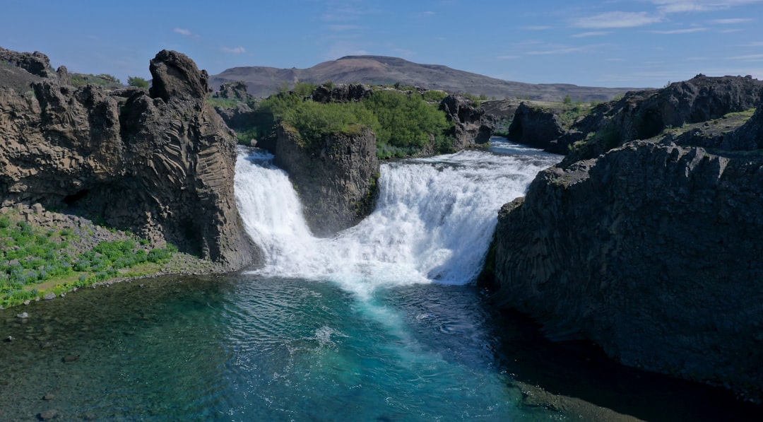 Hjálparfoss: The Twin Waterfalls of Basalt Arena - Hjálparvegur 3361 | Secret World Trip Planner