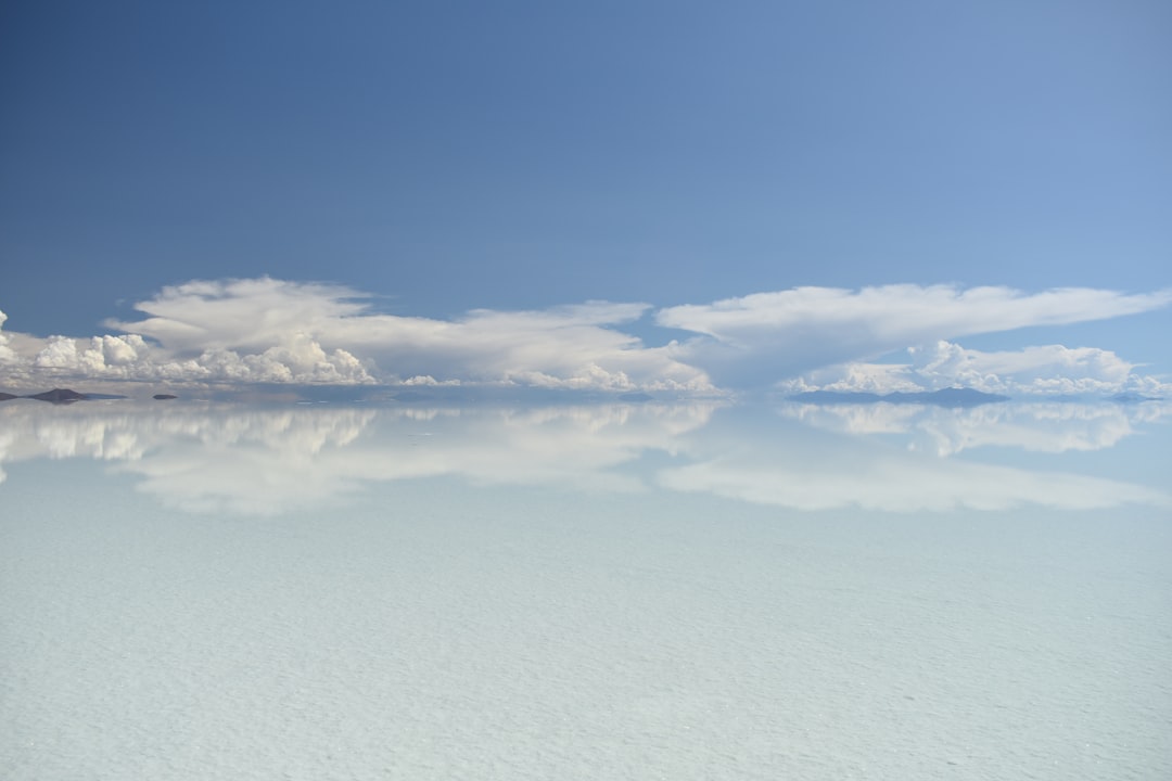 Salar de Uyuni au coucher du soleil : miroir du ciel bolivien - Bolivia South America | Secret World Trip Planner