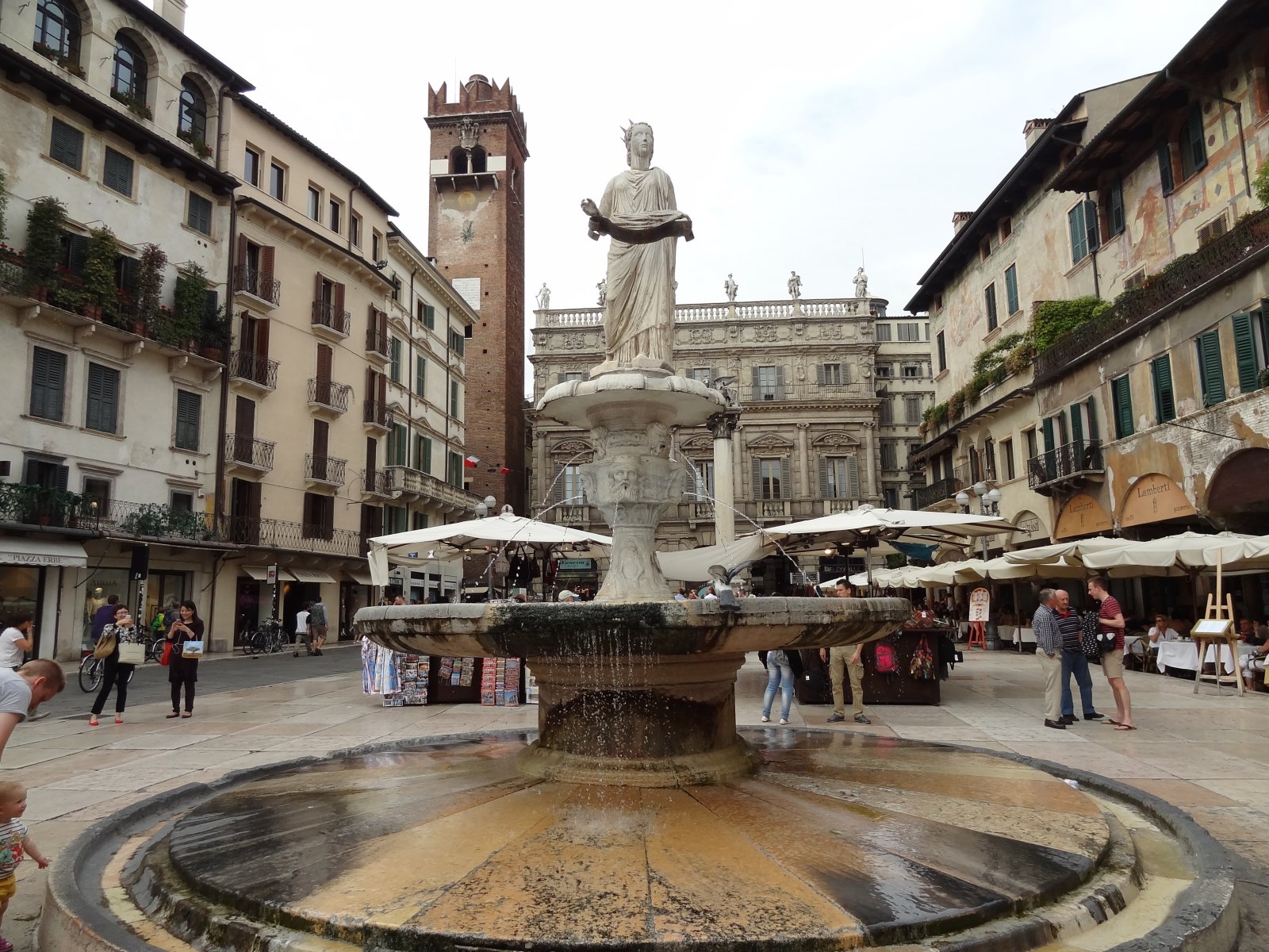 A spritz in Piazza delle Erbe - Verona | Secret World Trip Planner
