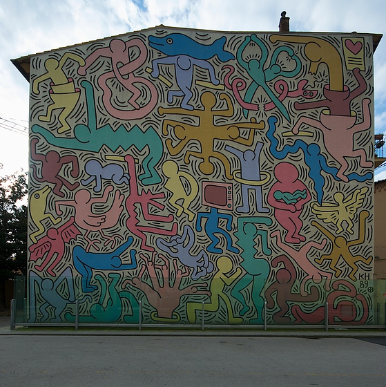 Tuttomondo freska pagal Keith Haring - Pisa | Secret World Trip Planner